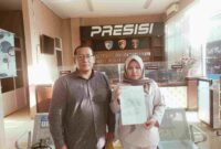 drg. Fradina didampingi Kuasa Hukum Makmur Malau, SH saat membuat laporan di Polda Sumut. (ist/nik)